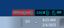 Red UTC / GMT / Zulu clock and local system time on Windows desktop above taskbar